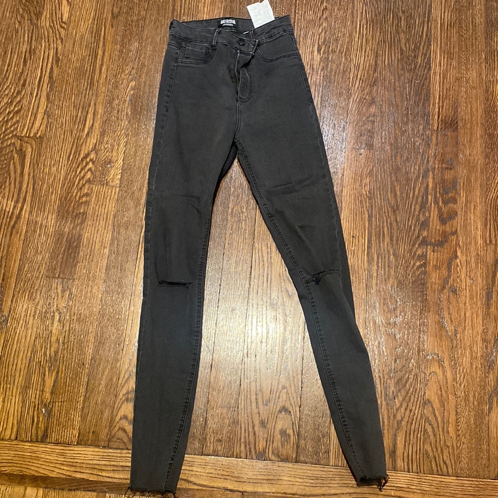 High waisted black ripped jeans